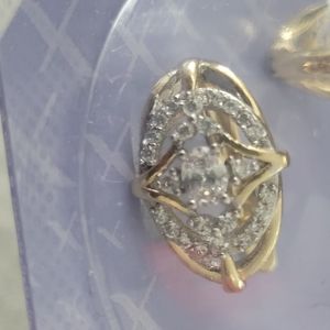 Gold and Diamond earrings. (Not real)